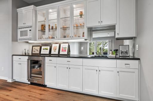 Wet bar with wine frig and microwave makes entertaining easy!