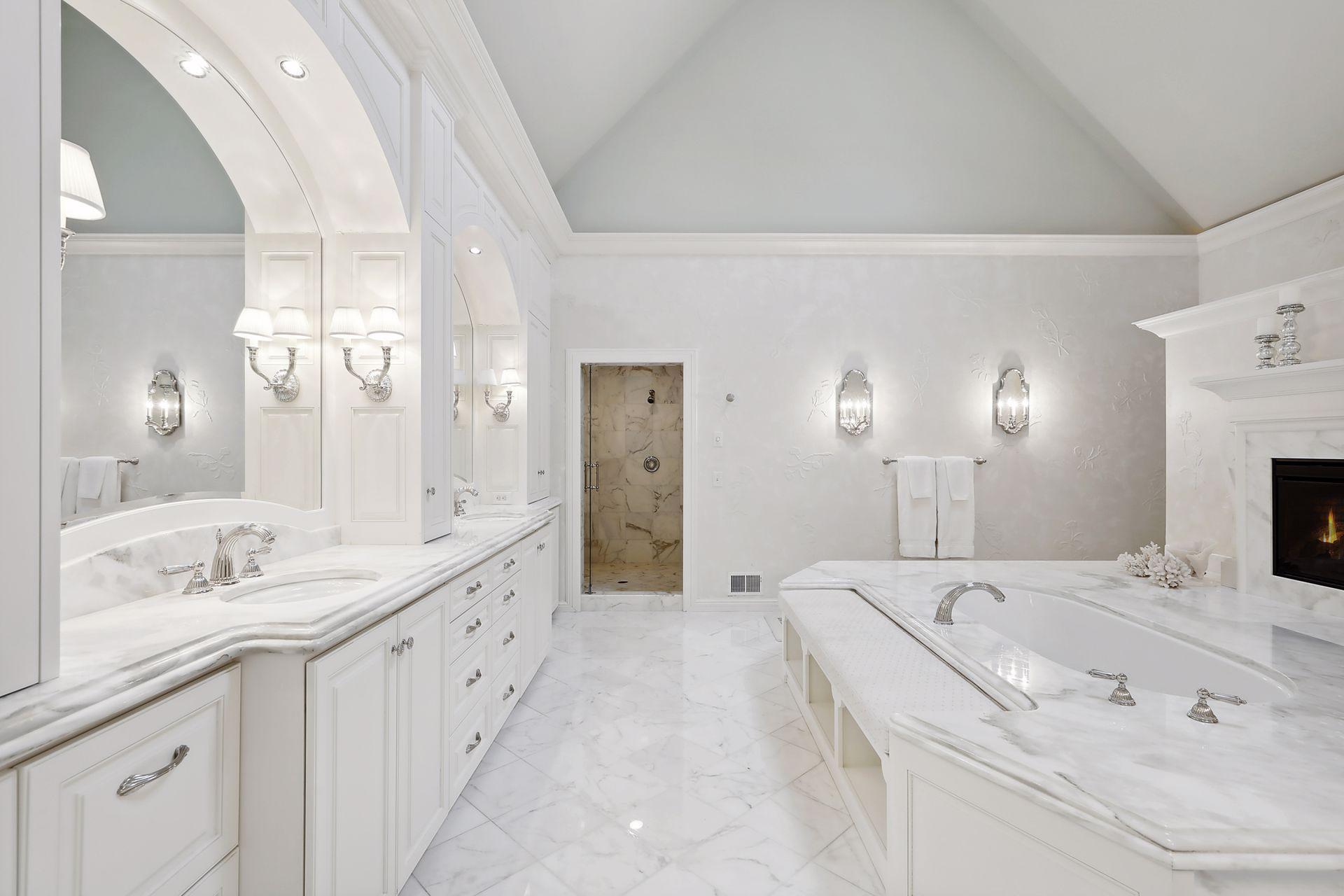 Spa Like Marble Bathroom, Double Sinks and Gas Fireplace