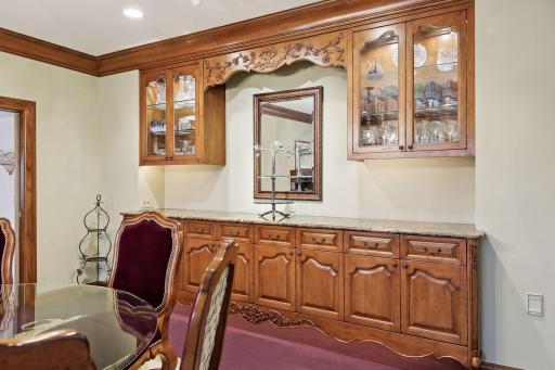 Built-In Buffet Cabinet and Well Appointed Lighting throughout
