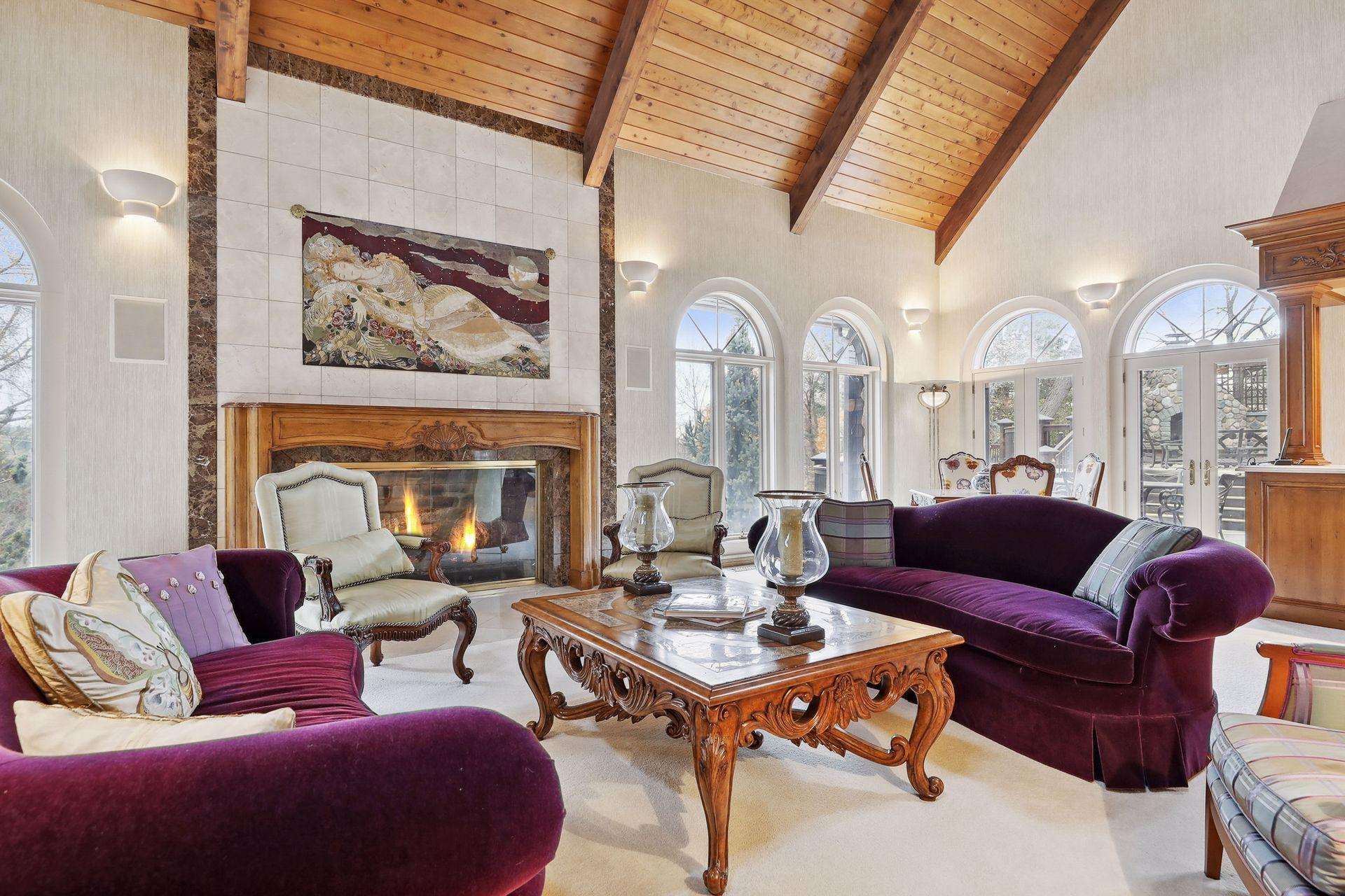 Double Doors allow access Brazilian Hardwood Decks and Views of Sunfish Lake