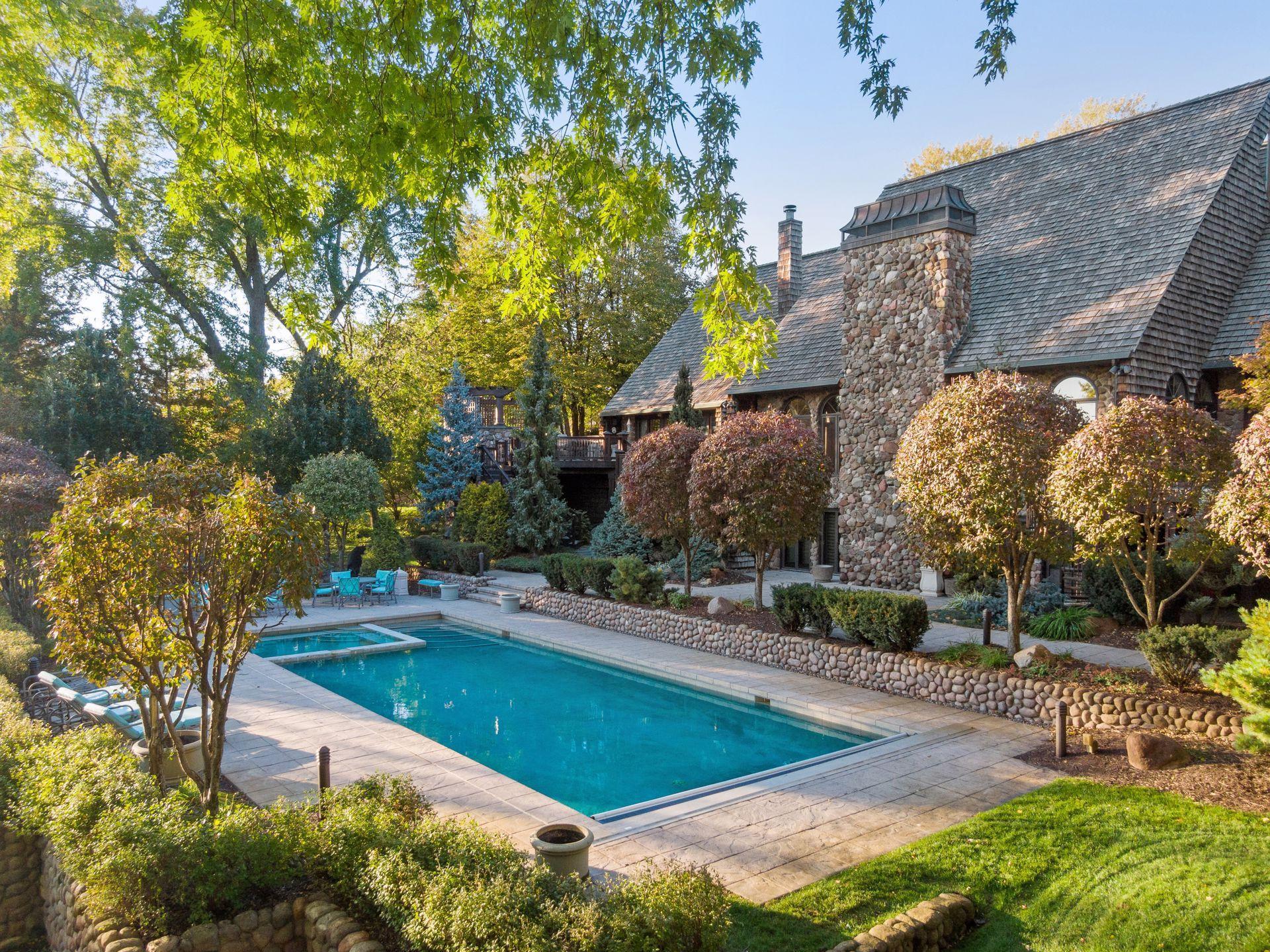 Well Manicured Trees and Extensive Landscaping, and Hardscape throughout