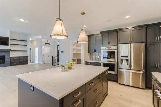 High-end Kitchen with SS appliances, double oven, and large kitchen island