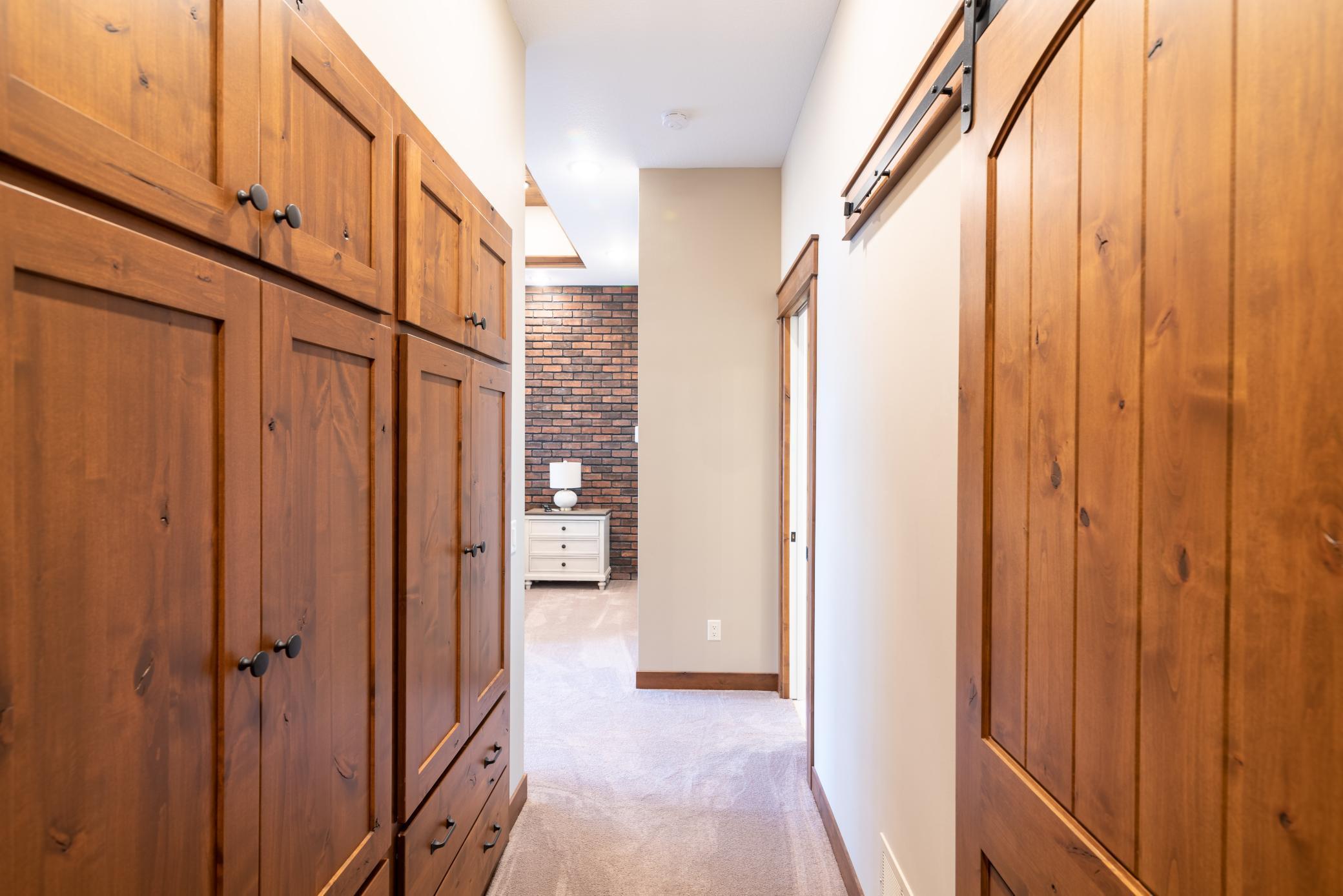 Built-ins and walk-in closet in primary suite