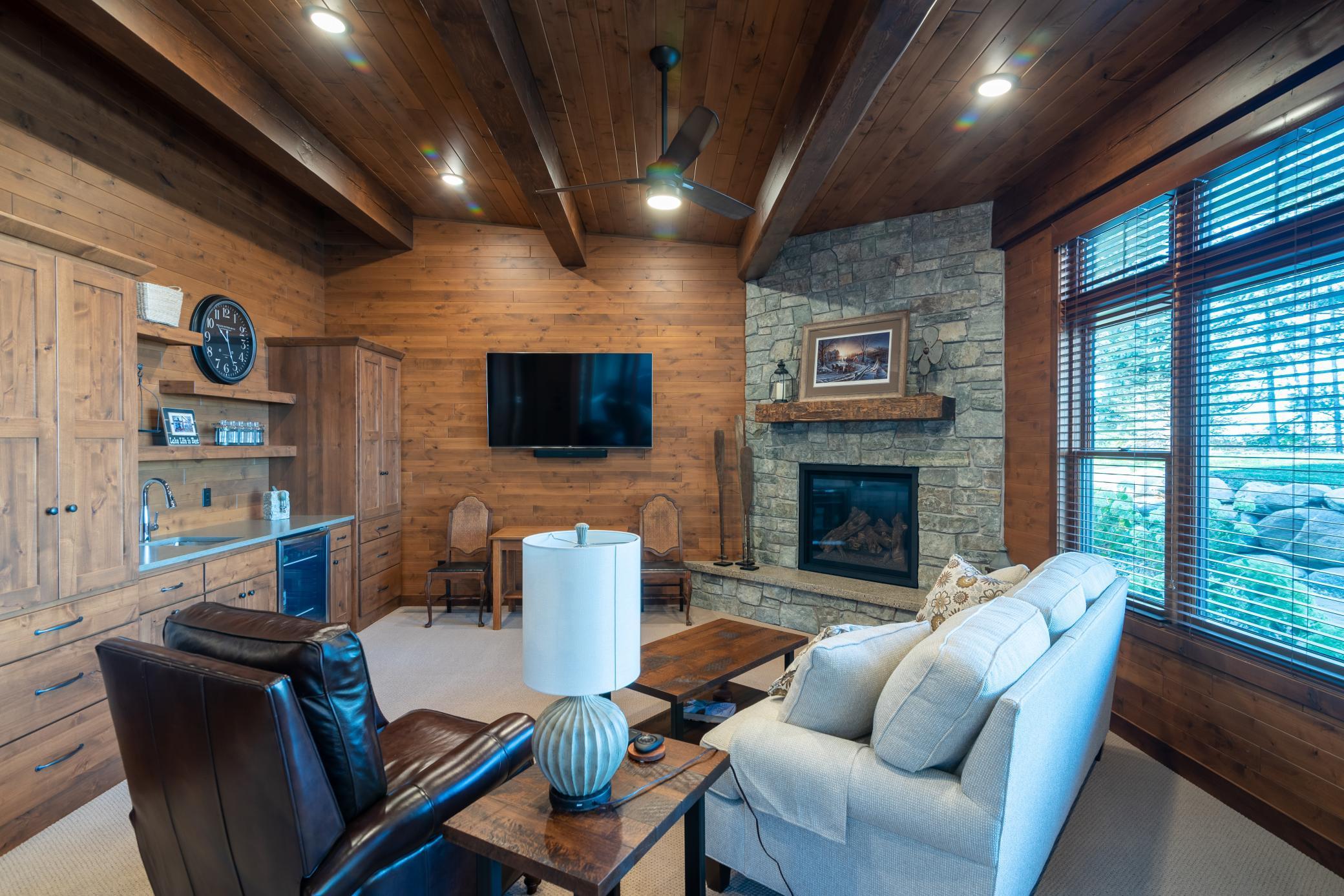 Comfortable four-season porch with wet bar