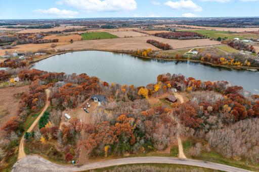 1.6 acres nestled between two homes, wooded privacy.