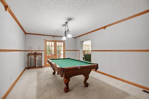 Billiard room that includes pool table