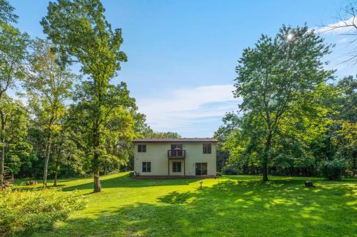 Side of house with master balcony