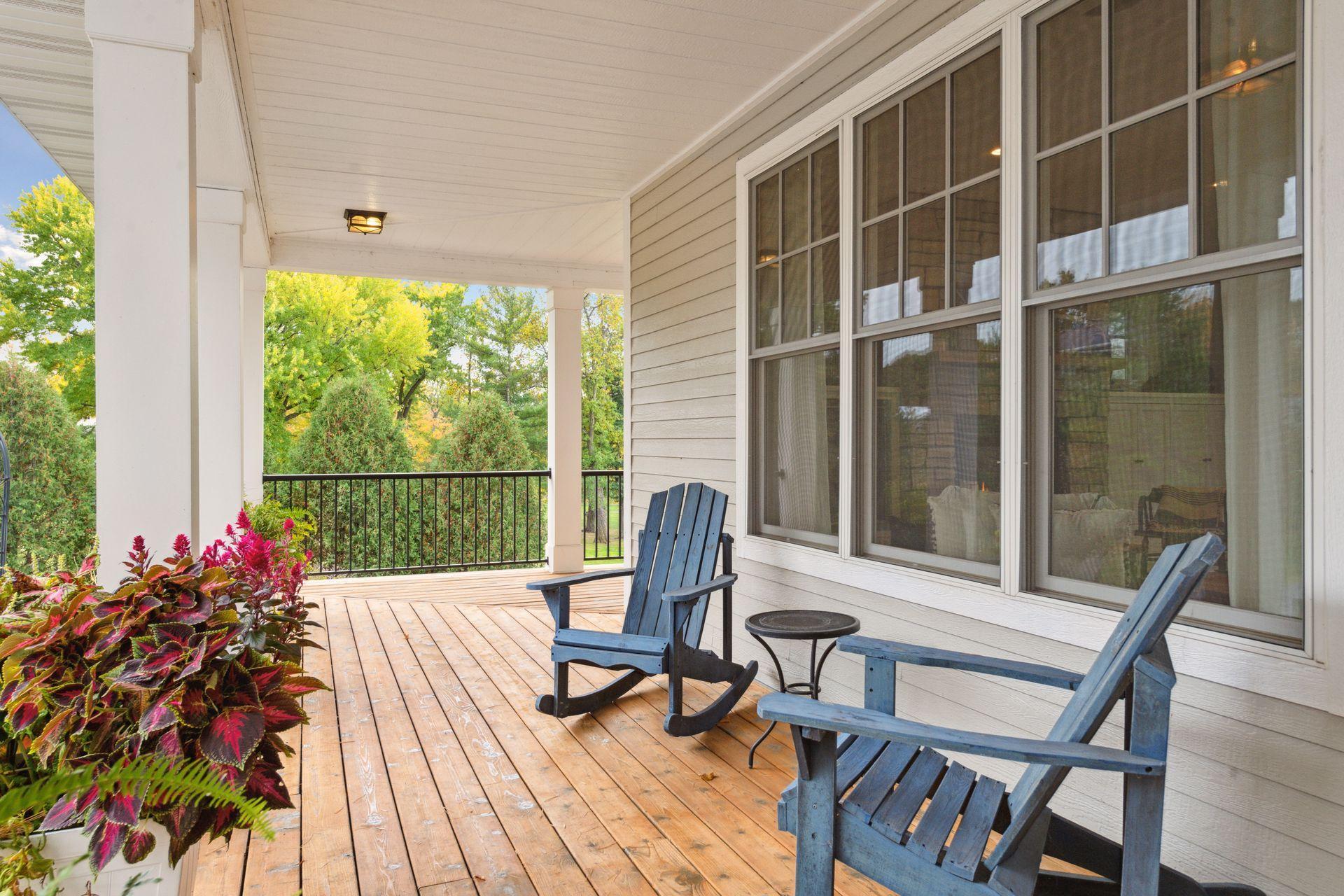Greet your company on front porch, wrap around to screened porch with lake views