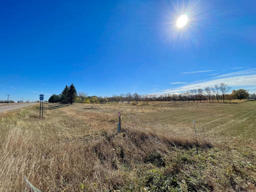 View from west driveway looking east toward pond area