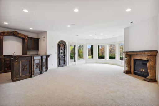 Elegant wet bar and wine room with awesome views