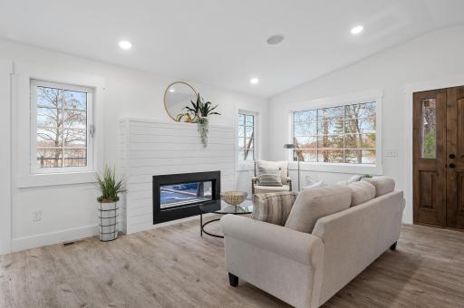 2 sided fireplace brings the outdoors in and vise versa