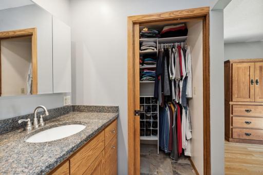 Pocket door access to owner suite walk in closet.