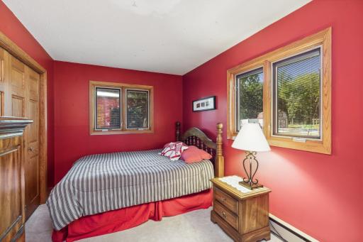 One of two additional bedrooms are found on the main level.