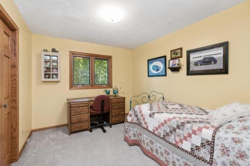 One of two additional bedrooms are found on the main level.