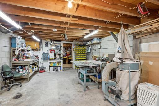 Currently the seller uses the unfinished areas for a shop and storage. They could be easily converted to bedrooms with the addition of an egress window.