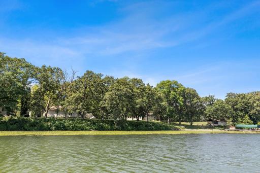 This lovely almost 5 acre piece of paradise boasts 1500’ of lake shore on the well-sought St Olaf lake in New Richland.