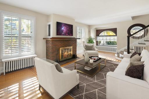 4639 Fremont Ave S - Living Room with wood burning fireplace. Enjoy the warmth from classic radiant heat in Winter, and modern high-velocity AC in the Summer.