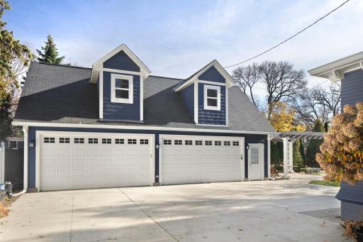 4639 Fremont Ave S - 4-car garage with stairs to storage/expansion space above.