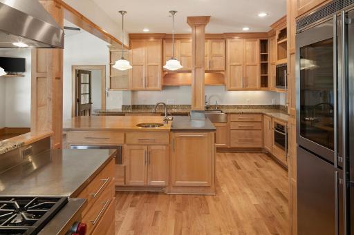 4639 Fremont Ave S - Enjoy the Wolf range with Vent-a-Hood, and the Liebherr Fridge with integrated wine cooler.
