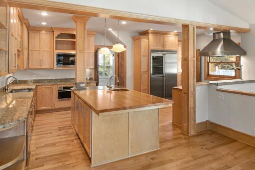 4639 Fremont Ave S - Cook's kitchen offers expansive space for prep, cook and clean. Enjoy the Meile Steam Oven, Wolf Microwave, Liebherr Fridge with included wine cooler.
