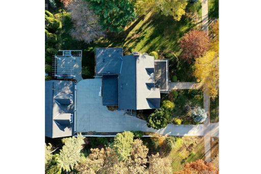 4639 Fremont Ave S - Aerial view of the 0.37 acre (120 ft wide by 134 ft deep) lot with over 6,000SF of southern side yard. Note the concrete driveway, pergola/blue stone patio. Roof from 2008.
