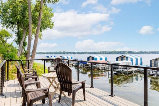 One of two additional entertainment areas set into professionally landscaped hillside overlooking the lake