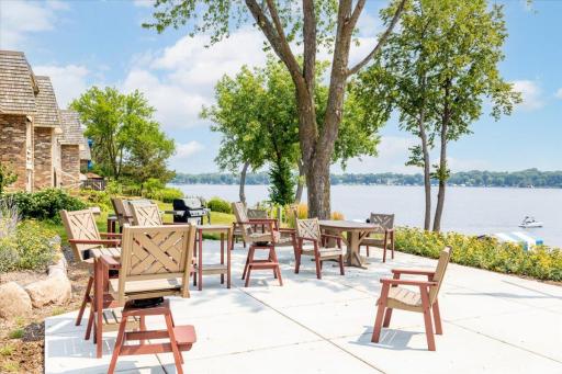 One of two additional entertainment areas set into professionally landscaped hillside overlooking the lake
