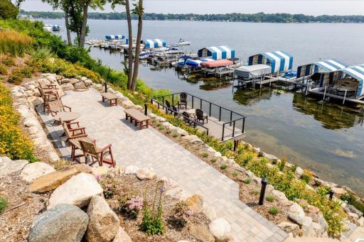 One of two additional entertainment areas set into professionally landscaped hillside overlooking the lake