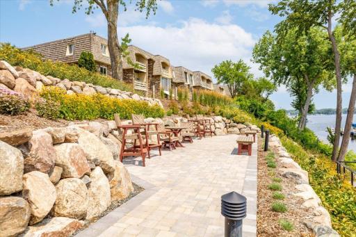 One of two additional entertainment areas set into professionally landscaped hillside overlooking the lake