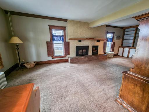 Large living area featuring wood fireplace