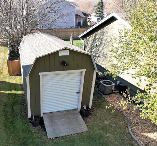 The shed was built in 08/2019. It is 20 x 11 x 10 with a treated ramp, 4 x 4 skid, 7 x 6 roll up door, electric, loft and matching shingles.