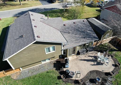 Photo for 8251 169th Street W, Lakeville, MN 55044 - Listing #6307744 Brand new roof in July of 2022. Entertain in the spacious and private back yard. The wood privacy fence has an extra wide gate. The paver patio is 27 x 15. Maintenance free rubber mulch to save you time and money!