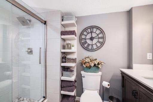 Photo for 8251 169th Street W, Lakeville, MN 55044 - Listing #6307744 Recently remodeled, luxury bathroom on the 3rd level. Custom tiled shower with glass door, tiled floor, comfort height stool and vanity.