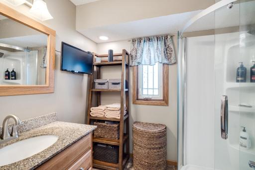 Photo for 8251 169th Street W, Lakeville, MN 55044 - Listing #6307744 Primary bedroom ensuite. Completely remodeled in April 2017. Comfort height stool and hardsurface vanity, new lights, corner shower, luxury vinyl plank flooring and paint.