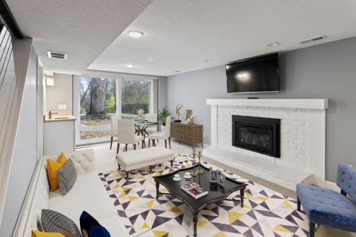 Family Room with walk-out patio door facing pond - basement
