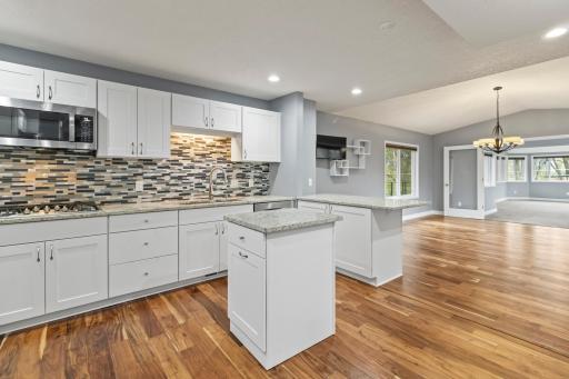 Kitchen with double oven and stainless steel appliances