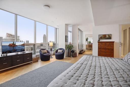 The main level bedroom suite faces East and enjoys sunrises, riverfront views to the Southeast, and Saint Paul landmarks in the distance.