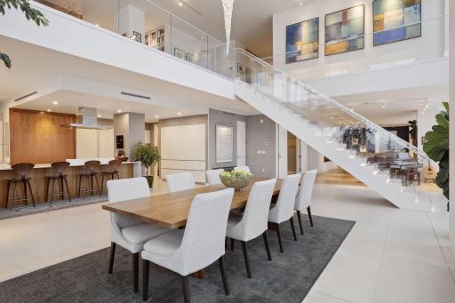 Custom Lutron lighting and electronic blinds are wired for smart home capabilities and voice controls.