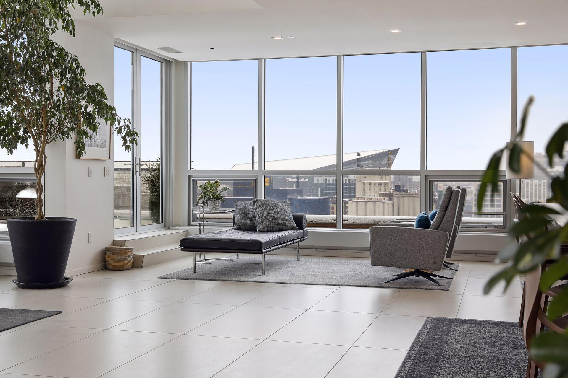 French doors lead to the outdoor terrace. Panoramic views of every iconic building and landmark.