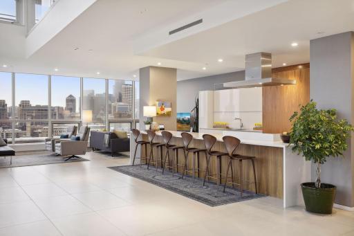 Custom designer kitchen with plenty of counter top seating.