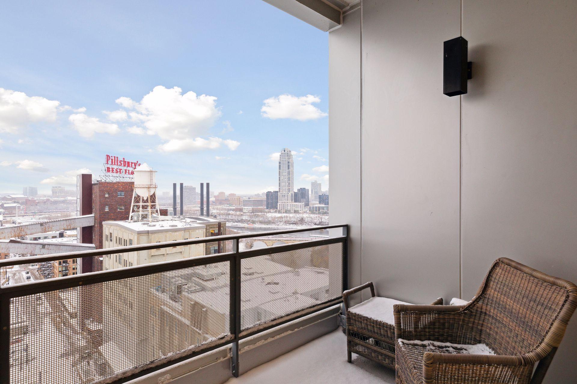The primary suite terrace is recessed to provide privacy and protection from the weather. Views include sunrises, historic flour mills, the Stone Arch Bridge, and the Mississippi river.