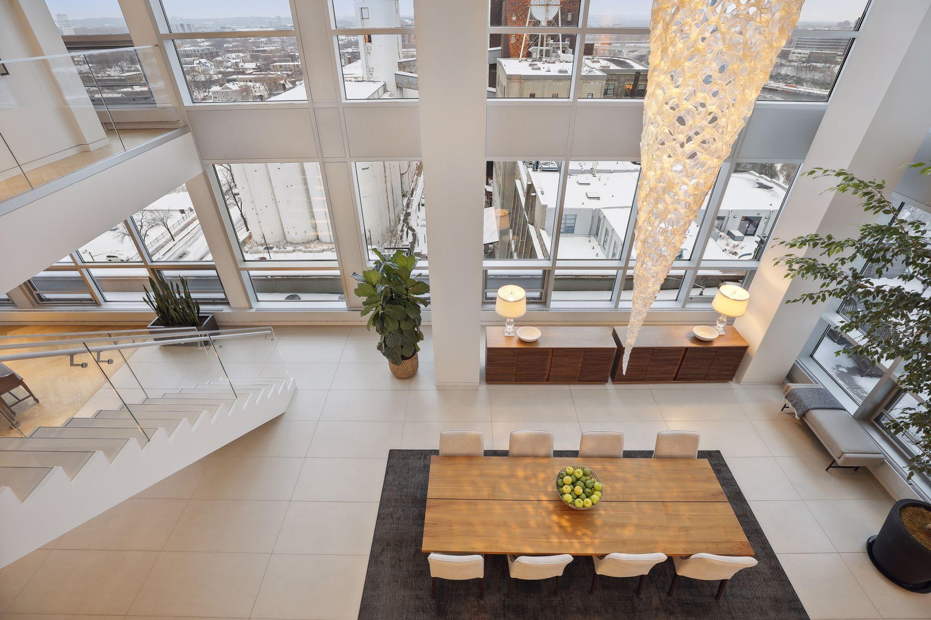 View of the formal dining area from the upper level library and den.