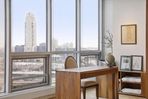 Riverfront and Mill District views from the upper level primary bedroom suite.