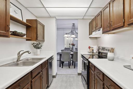 The well-designed kitchen boasts expanses of sensible workspace to prepare your favorite recipes.