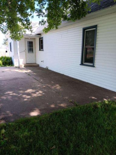 back entry wtih cement patio.jpeg