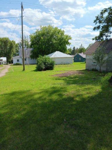 backyard with 3 buildings.jpeg