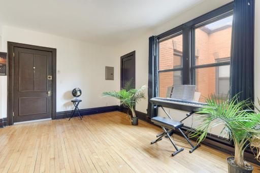 The living space has original hardwood floors and great light!