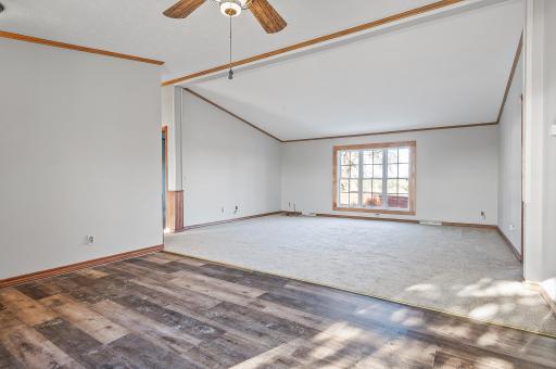 Large living room with vaulted ceiling in house #2.