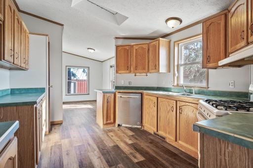 Large kitchen with breakfast nook in house #2.