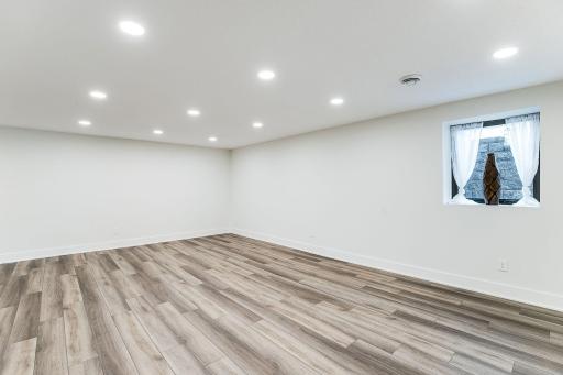 Amusement Area in Lower Level with egress window can easily convert into 4th bedroom